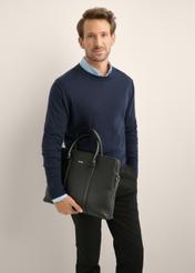 Black men's leather briefcase TORMS-0536-9I(Z26), front view of the product in the model's hand, on a light background.