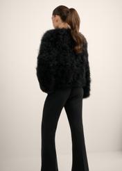 Women's black turkey feather fur coat FUTDF-0097A-99(Z26), back view of the product on the model. Half of the silhouette visible.