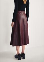 Burgundy leather midi skirt SPCDS-0077-2869(Z25), product view from the back on the model. Half of the silhouette visible.
