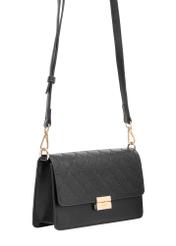 Black women's handbag with monogram TOREC-1046-98(Z25), visible product diagonally with a strap, photo on a white background.
