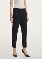 Black women's trousers with a crease SPODT-0098-99(Z24), product view from the front on the model, half of the silhouette visible.