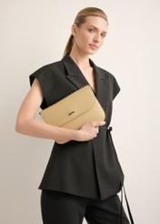 Beige women's shoulder bag TOREC-1262-1B(Z26), front view of the product on a model. Half of the silhouette visible.