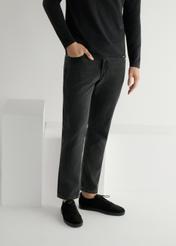 Black men's leather shoes BUTYM-0529-99(W26), side view of the product on the model, half of the silhouette visible.