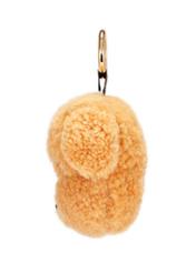 Brown dog-shaped keychain BRELOK-210A-81(Z25), side view of the product on a white background.