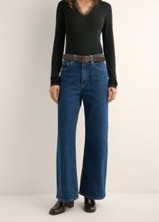 Women's navy blue denim pants JEADT-0013-7D(Z26) - front view of the product, on a model, against a light background. Half of the silhouette visible.