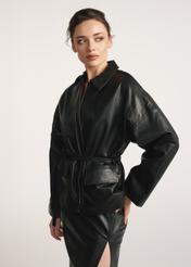 Black women's leather jacket with ties KURDS-0547-2861(Z25), front view of the product on the model, half of the silhouette visible.
