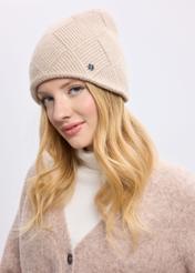 Beige women's winter hat CZADT-0193A-81(Z25) - front view of the product on a model on a white background.
