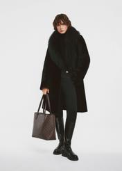 Women's brown shopper bag TOREC-0816A-89(Z25) - product view on a model on a white background. The entire silhouette is visible.