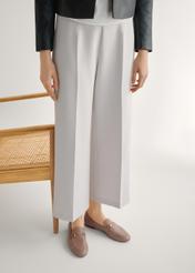 Women's leather moccasins in dirty pink color BUTYD-0916A-5D(W26), front view of the product on the model's feet.