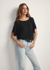 Women's black ribbed blouse BLUDT-0170-99(W25), front view of the product on the model. Half of the silhouette visible.