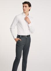 White men's shirt KOSMT-0352-11(Z25), front view of the product on the model, part of the silhouette visible.
