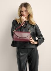 Classic burgundy leather handbag TORES-1371-4D(Z26), product view in model's hands. Half of silhouette visible.