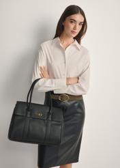 Large black women's handbag TOREC-1139-9I(W26), front view of the product on a model, half of the silhouette visible.