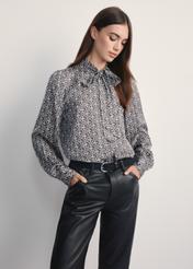 Women's shirt with monogram KOSDT-0175-96(Z25), front view of the product on a model, half of the silhouette visible.