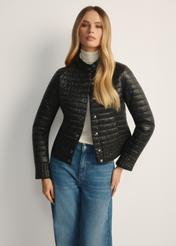 Black women's quilted jacket with a stand-up collar KURDT-0441-99(Z25), product view from the front on the model, half of the silhouette visible.