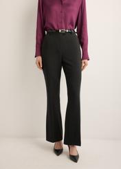 Women's black pleated trousers SPODT-0128-99(Z26), front view of the product on the model. Half of the silhouette visible.