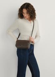 Small brown women's handbag TOREC-1173-1I(W26), product view on model's shoulder. Half of silhouette visible.