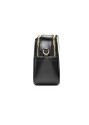 Black small women's handbag TOREC-1126-99(W26), product view from the side on a white background.