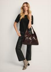 Large burgundy leather women's handbag TORES-1179-49(Z25), front view of the product on a model, the entire silhouette is visible.