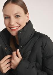 Black women's winter jacket KURDT-0614-99(Z25), close-up of product details on the model, 1/5 of the silhouette visible.