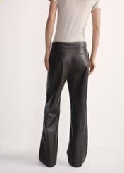 Women's brown leather trousers SPODS-0045-3207(Z25), product visible from the back on the model, half of the silhouette visible.