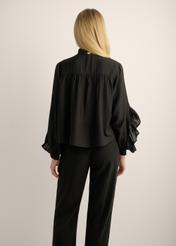 Women's black shirt KOSDT-0192-99(Z26). Rear view of the product on a model, showing half of the figure. 