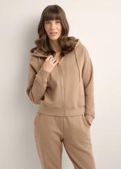 Women's camel zip-up hoodie BLZDT-0122-1D(Z26), front view of the product on the model. Half of the silhouette visible.
