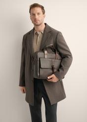 Brown leather men's laptop bag TORMS-0522-1H(Z26), diagonal view of the product in the model's hand, on a light background.