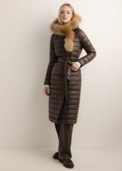 Dark brown long women's jacket with fur KURDT-0706-1I(Z26), front view of the product on the model. Full body visible.
