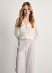 Cream women's cardigan with buttons KARDT-0044A-12(Z25), product visible from the front on the model, half of the silhouette visible.