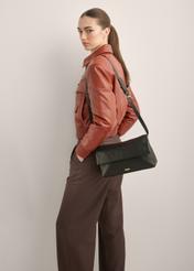Women's black leather handbag TORES-1375-99(Z26), front view of the product on a model. Half of the silhouette visible.