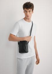 Black leather men's bag TORMS-0454-99(W25), front view of the product on the model, half of the silhouette visible.