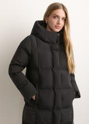 Black women's winter jacket KURDT-0699-99(Z26), front view of the product on the model. Half of the silhouette visible.