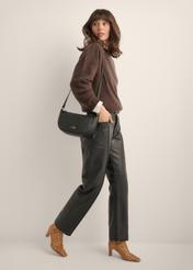 TORES-1426-9I(Z26) semi-circular women's handbag, front view of the product on a model. Full body visible.