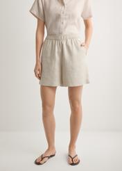 Women's light beige linen shorts SZODT-0019-1A(W26), front view of the product on the model. Half of the silhouette visible.
