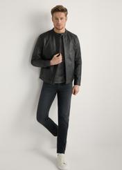 Black men's leather jacket KURMS-0406-99(W26) - front view of the product, on a model, against a light background. Full silhouette visible.