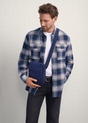 Navy men's TORMN-0384-69(Z25) waist bag, product view on model. Half of the silhouette visible.