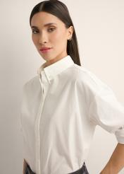 Cream oversize women's shirt KOSDT-0193-0C(Z26), diagonal view of the product on the model, half of the silhouette visible.