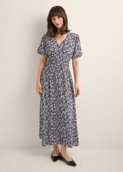 Long floral dress in navy blue SUKDT-0191-7I(W26), front view of the product on the model. Full body visible.