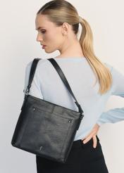 Black leather women's handbag TORES-1157-99(Z25) - product view on a model on a white background. Half of the silhouette visible.