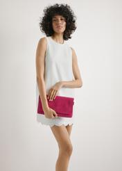 Pink suede women's handbag TORES-1247-5E(W26) - front view of the product, held by the model in her hand, on a light background. Half of the silhouette is visible.