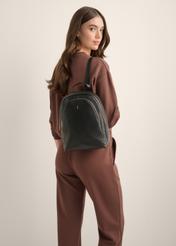 Black leather women's backpack TORES-1355-9I(Z26), front view of the product on a model. Half of the silhouette visible.