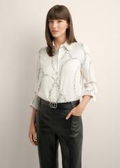 White women's shirt with print KOSDT-0172-0P(Z26), product view from the front on the model, half of the silhouette visible.