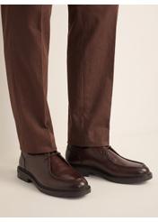 Men's dark brown leather shoes BUTYM-0587-1I(Z26), diagonal view of the product on the model. Half of the silhouette visible.