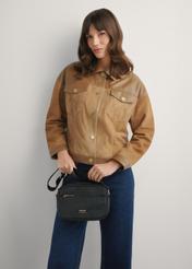 Black nylon women's messenger bag TOREN-0309-99(W25), front view of the product on the model, half of the silhouette visible.