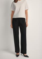 Black elegant women's trousers SPODT-0106A-99(W26), product view from the front on the model, half of the silhouette visible.