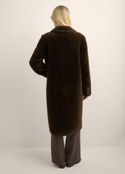 Women's long brown fur coat FUTDP-0087-1I(Z26) - back view of the product, on a model, against a light background. The entire silhouette is visible.