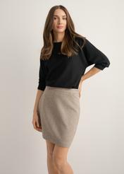 Black women's blouse BLUDT-0178-99(Z25), front view of the product on the model. Half of the silhouette visible.