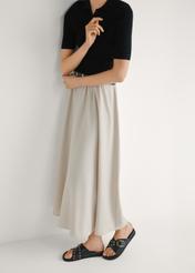 Women's leather flip-flops in black BUTYD-1268-99(W26), side view of the product on the model's feet.