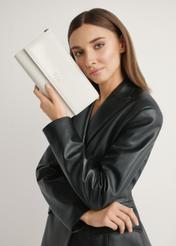 Cream clutch bag TOREC-1210-0B(W26) - view of the product held in the model's hand, against a light background. Half of the silhouette visible.